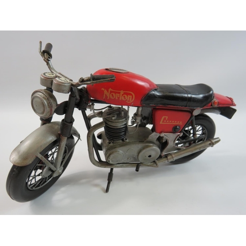 199 - Tinplate model of a Motorcycle based on a Norton Commando in good order along with a Resin model mot... 