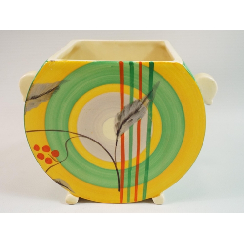 216 - Clarice cliff 1930 pot with twin handles circular pattern, standing approx 11cm tall.