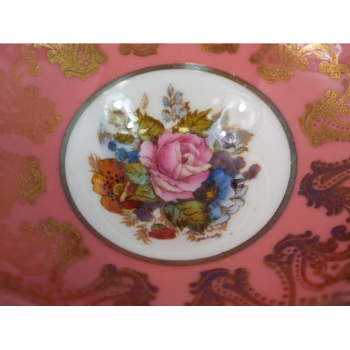 221 - Aynsley Cabinet cup and saucer with the cabbage rose pattern to the centre signed J A Bailey.