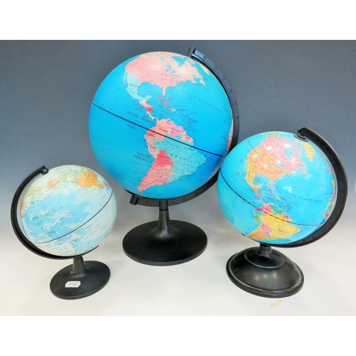 405 - Trio of Graduated education Globes. The tallest is 15 inches tall. See photos.