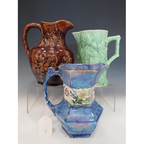 408 - Trio of Collectable jugs by Maling, Sylvac, Woods.  Tallest is 10 inches tall. See photos.