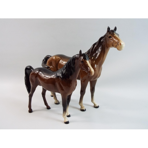 277 - 2 Brown Beswick horses one has had a repair to 1 leg.