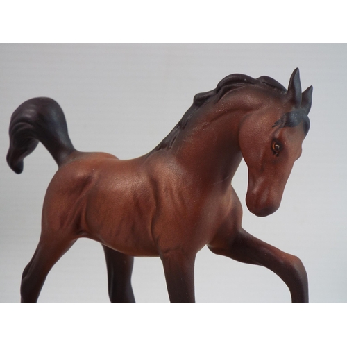 280 - Royal Doulton foal on wooden plinth 