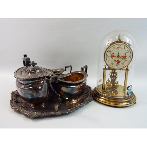 307 - Silver plated teaset and tray plus a anniversary clock.