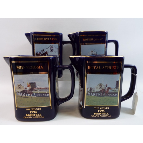 312 - 4 Martell Grand National Winners Jugs.