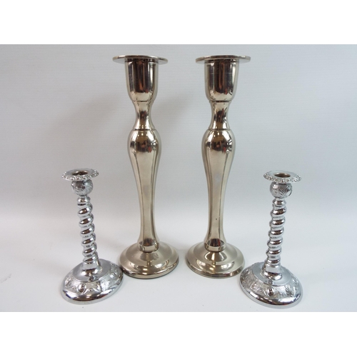 319 - 2 Pairs of silver plated candlesticks.