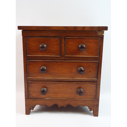 332 - Small desk top wooden chest of drawers, 11