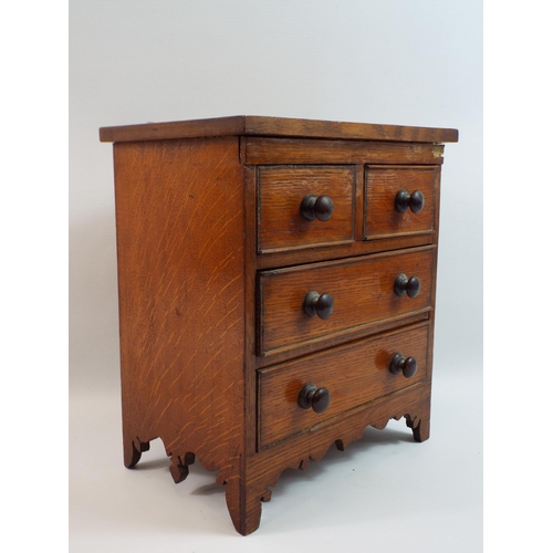 332 - Small desk top wooden chest of drawers, 11