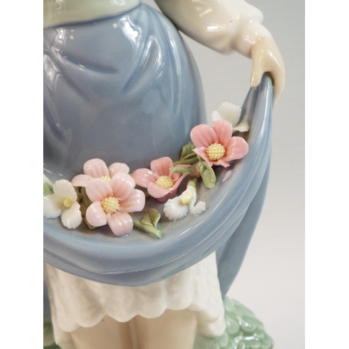 355 - Nao Lladro figurine of a girl with flowers on her dress (slight damage to a few petals see pics)