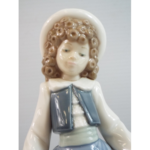 355 - Nao Lladro figurine of a girl with flowers on her dress (slight damage to a few petals see pics)