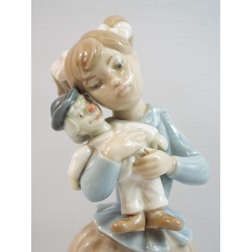 357 - Nao Lladro figurine girl with clown doll.