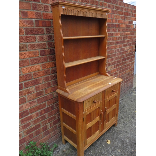 521 - light wood dresser with plate rack above. H:68 X W:36 X D:16 inches. See photos.PA574