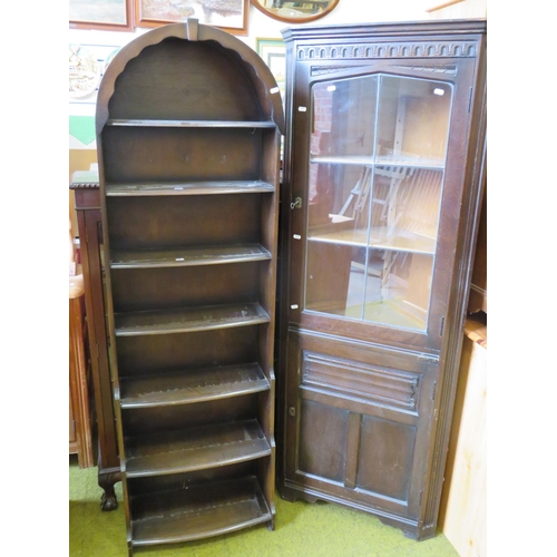 528 - Darkwood waterfall bookcase with curved top along with a darkwood corner cabinet with leaded glass t... 