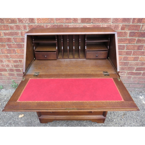 530 - Mid 20th Century two drawer bureau with two short drawers above. Leather writing slope within. H:39 ... 