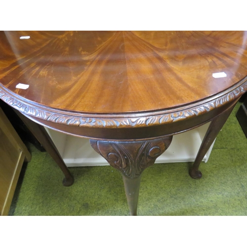 535 - Darkwood Half moon hallway table. Decorative edging.  H: 32 X W:29 X D:15 inches. See photos.