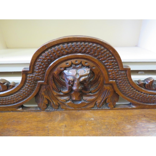 536 - Interesting antique oak hall table with lots of decorative carving to legs, apron and head. H:30 X W... 