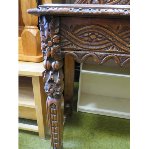 536 - Interesting antique oak hall table with lots of decorative carving to legs, apron and head. H:30 X W... 