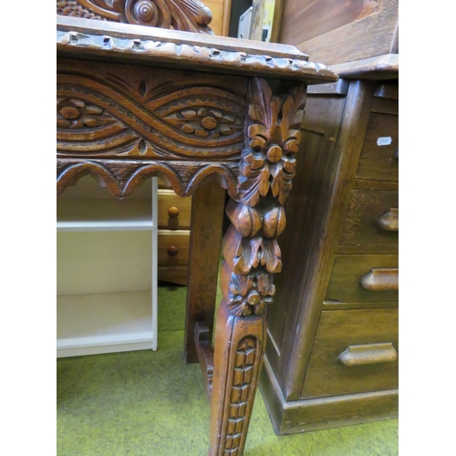 536 - Interesting antique oak hall table with lots of decorative carving to legs, apron and head. H:30 X W... 