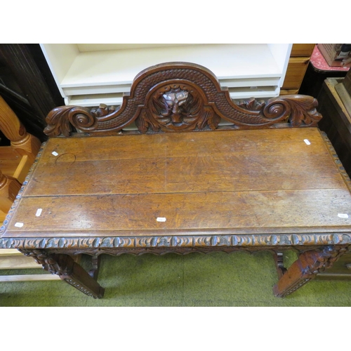 536 - Interesting antique oak hall table with lots of decorative carving to legs, apron and head. H:30 X W... 