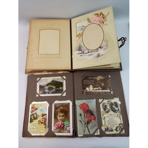 484 - A Vintage musical leather bound photo album & A album of vintage postcards