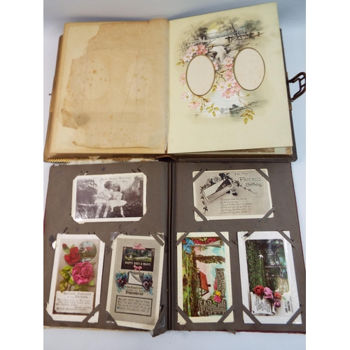 484 - A Vintage musical leather bound photo album & A album of vintage postcards