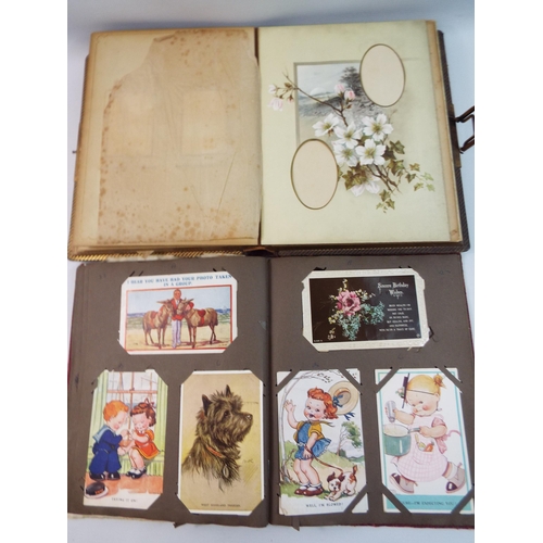 484 - A Vintage musical leather bound photo album & A album of vintage postcards