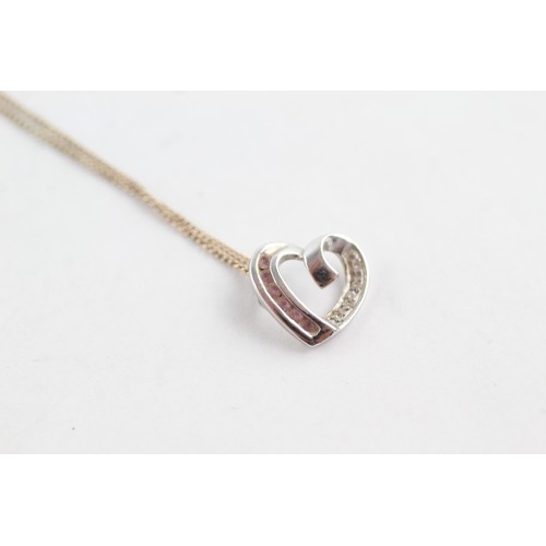 670 - 9ct gold diamond and pink gemstone heart necklace (1.8g)      752653