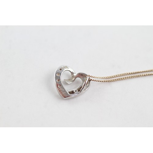 670 - 9ct gold diamond and pink gemstone heart necklace (1.8g)      752653