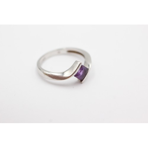 674 - 9ct white gold amethyst tension setting ring (2.5g)     752979