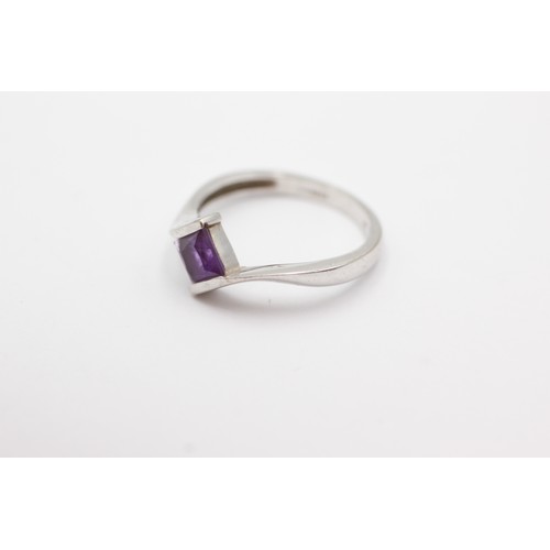 674 - 9ct white gold amethyst tension setting ring (2.5g)     752979