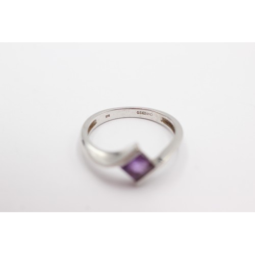 674 - 9ct white gold amethyst tension setting ring (2.5g)     752979