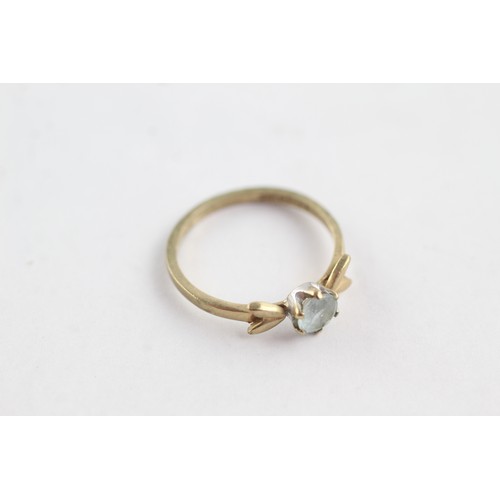 676 - 9ct gold aquamarine bow detail ring (1.3g)     752988