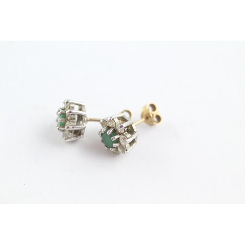 686 - 9ct white gold emerald and diamond halo stud earrings (2.8g)     752620