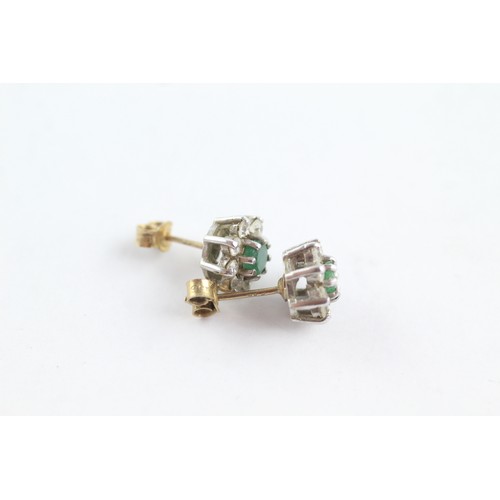 686 - 9ct white gold emerald and diamond halo stud earrings (2.8g)     752620