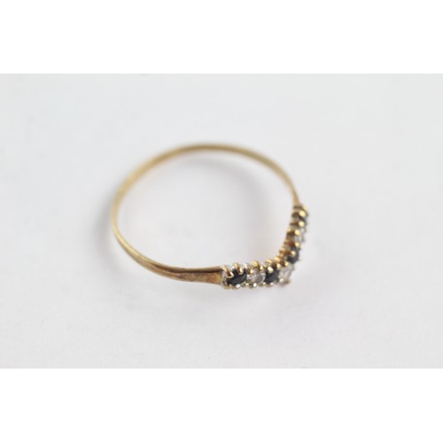 687 - 9ct gold sapphire and clear gemstone wishbone ring (0.9g)     752649