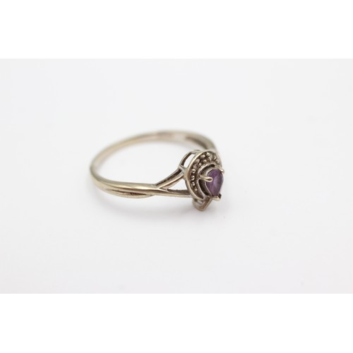 691 - 9ct white gold amethyst and diamond halo ring (1.8g)      752635