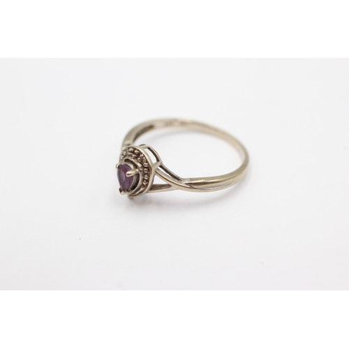 691 - 9ct white gold amethyst and diamond halo ring (1.8g)      752635