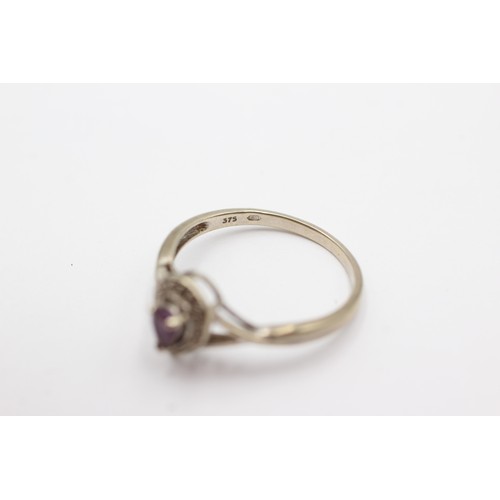 691 - 9ct white gold amethyst and diamond halo ring (1.8g)      752635