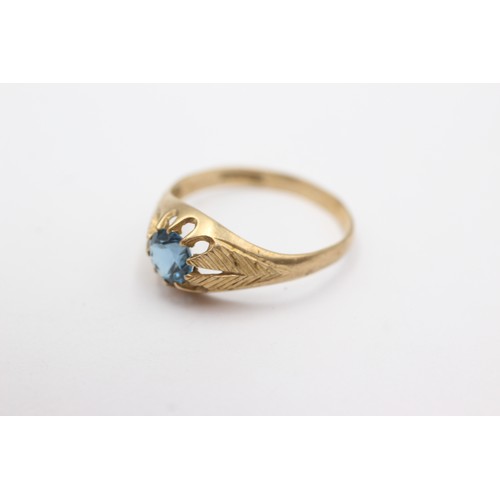 693 - 9ct gold topaz solitaire ring (2g)     752973