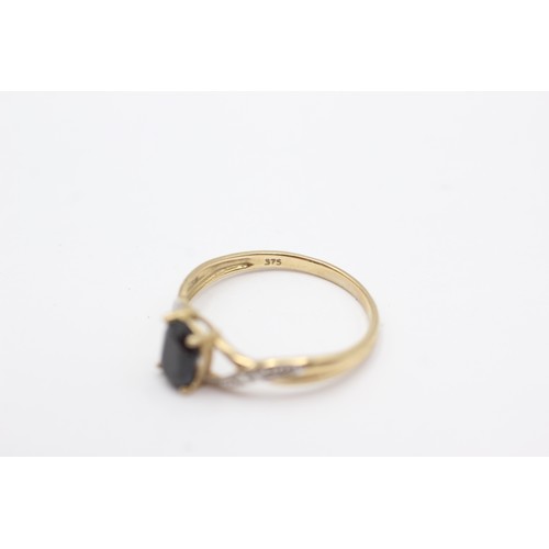 695 - 9ct gold sapphire and diamond twist band ring (1.5g)     753090