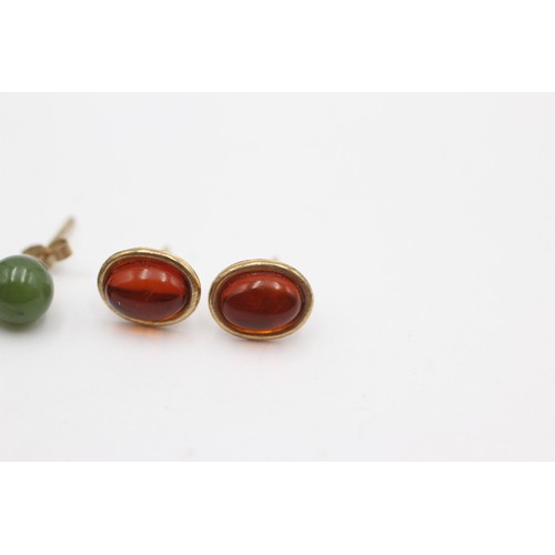 706 - 4 x 9ct gold paired gemstone stud earrings inc. nephrite & amber (1.3g)     752612