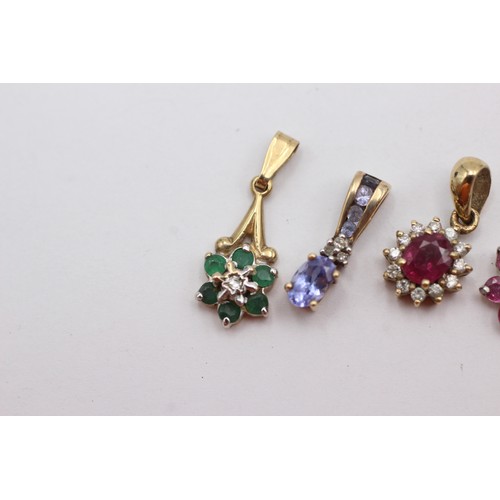 707 - 4 x 9ct gold gemstone & diamond set pendants inc. emerald, ruby & tanzanite (2.7g)     752615