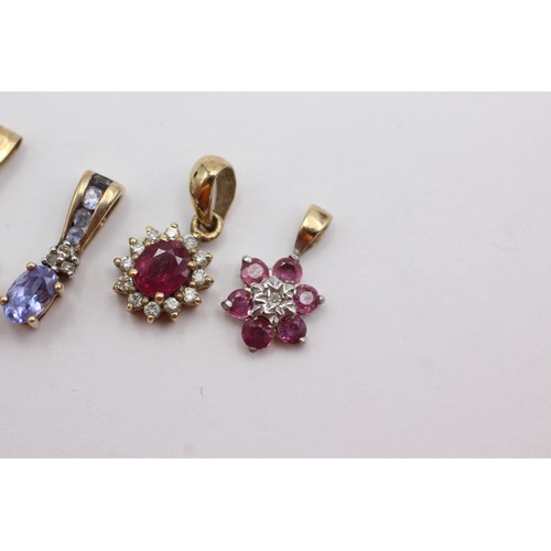 707 - 4 x 9ct gold gemstone & diamond set pendants inc. emerald, ruby & tanzanite (2.7g)     752615