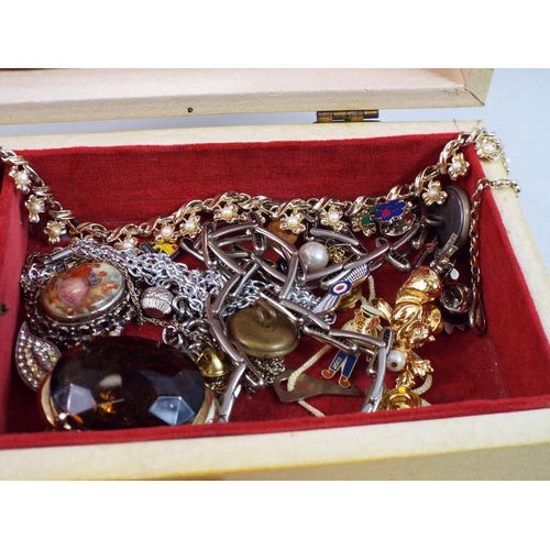 721 - Jewellery box and selection of costume jewellery and pin badges.