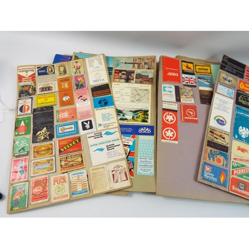 723 - 2 Scrap books full of vintage matchboxes.