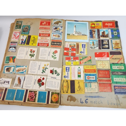 723 - 2 Scrap books full of vintage matchboxes.