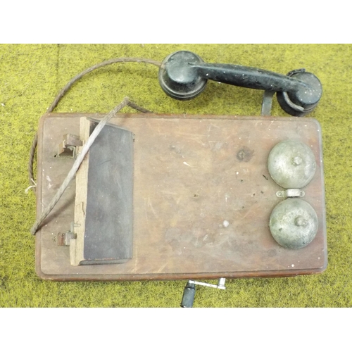 782 - Vintage wall mounted wind up telephone, some damage to the wood see pics.