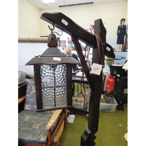 569 - Late 20th Century Adjustable height standard lamp as an antique coaching lamp. See photos