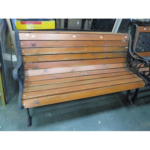 581 - Nicely made garden bench with Metal sides,, Curved back support teak stretches. 49 inches wide. See ... 