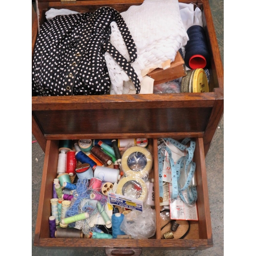 582 - Early 20th Century Sewing basket with front drawer and hinged top lid. Lots of sewing paraphanalia w... 